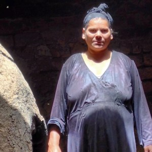 Balyana woman by oven